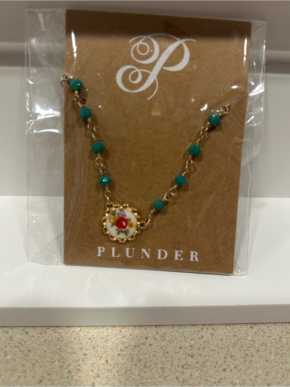 Plunder necklace turquoise necklace and floral pendant  NWT boho necklace